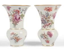 A pair of Chelsea porcelain Red Anchor period vases, 1752-56,each with trumpet rim over a squat