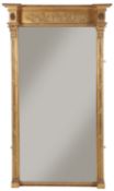 A Regency carved gilt wood and gesso pier glass, the moulded breakfront pediment over a frieze