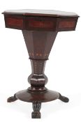 An Irish Killarney arbutus, yew and marquetry work table, mid 19th century,the moulded octagonal top