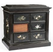 An Italian ebony and pietra dura table cabinet, 19th century,fitted with three drawers, each with