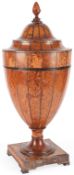 A George III West Indian satinwood urn-shaped cutlery vase, circa 1790,with remnants of inlay, on