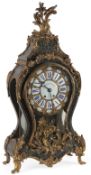 A Louis XV style Boulle bracket clock, 19th century,the cast gilt brass dial set with enamel Roman