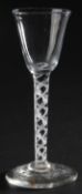 A George III mercury and opaque twist stem wine glass, circa 1755,with funnel bowl over an
