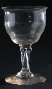 A George II sweetmeat glass, circa 1745,the ogee bowl with everted rim, over a drawn Silesian stem