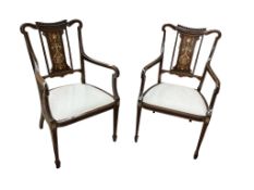 A pair of Edwardian mahogany, ivory and boxwood inlaid open elbow chairs, bearing ivorine labels,