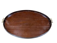 A George III oval mahogany two handled tea tray, width 74cm, (repaired)