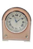 A boxed Cartier stainless steel and pink enamel bedside clock, height 8cm.
