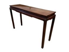 A Chinese hardwood console table, width 134cm, depth 41cm, height 84cm