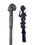 A Yoruba bronze figural staff top, 19th century, and a later Yoruba brass staff, length 84cm