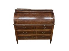 An early 19th century French mahogany cylinder bureau, width 125cm, depth 60cm, height 115cm