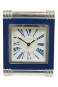 A Cartier strut travel clock, stainless steel and lapis enamel REF 6603, height 9cm.