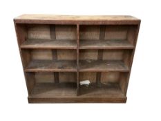 In the manner of Heals, a limed oak open bookcase, width 133cm, depth 29cm, height 103cm