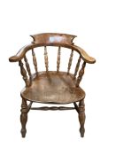 A 19th century elm and beech smoker's bow chair, width 61cm, depth 50cm, height 77cm