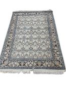 A North West Persian pale green ground rug, 182 x 122cm