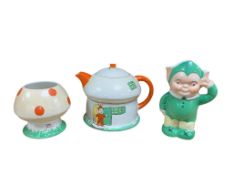 A Shelley Mabel Lucie Attwell three-piece enamelled porcelain 