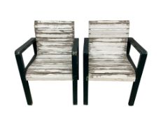 A pair of slatted painted teak garden chairs, width 58cm, depth 52cm, height 83cm