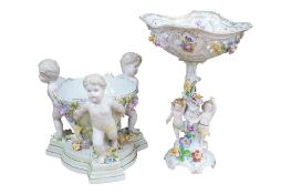 A German floral encrusted porcelain centrepiece, height 24cm and a similar comport (2)