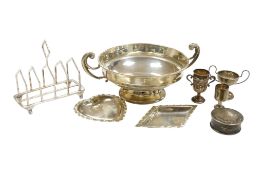Two early 20th century miniature silver trophy cups, a small silver goblet, a silver toast rack, a