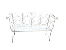 A wrought iron garden bench, width 143cm, depth 43cm, height 92cm