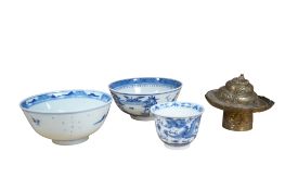 Two Chinese blue and white bowls and a similar porcelain tea bowl with associated Tibetan brass