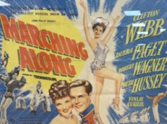 A vintage Marching Along poster, framed, 74 x 100cm
