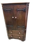 A Gothic style oak cupboard, width 71cm, depth 46cm, height 122cm