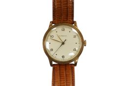 A gentleman's steel and gold plated Longines manual wind wrist watch, with Arabic and dot