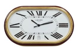 A boxed Must de Cartier accordian desk timepiece, width 14cm.