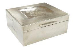 A 1950's silver mounted square cigarette box with engraved inscription relating to the formula one