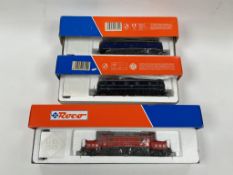 Three boxed Roco HO gauge electric locomotives; an OBB 1020.010-3 (43738), a DB E18 045 (43659), and