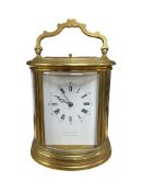 A French oval repeating carriage clock , signed Martin & Son
