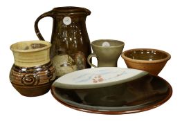 A St Ives studio pottery jug and cup, larger height 15cm, and four further pieces of studio pottery,