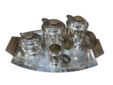 An Art Deco silver plated tea service with wooden handles, tray 53cm wide (5)