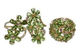 Three assorted recent 9ct gold, tsavorite garnet and simulated diamond cluster set dress rings,