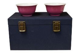 A pair of Chinese ruby glazed cups, Yongzheng marks, height 4.5cm, boxed.