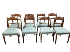 A set of eight Regency mahogany dining chairs, two with arms (one bar different), carver chairs