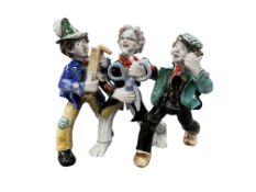 Anzengruber Keramik, Wien, group of vagabonds, circa 1949, height 21cm.