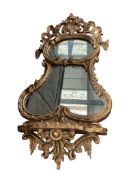 A 19th century Rococo Revival giltwood mirror with bracket shelf, width 49cm, depth 15cm, height