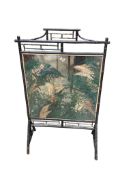 A Victorian painted bamboo firescreen, width 69cm, depth 35cm, height 108cm