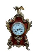 A Louis XV style gilt metal mounted faux tortoiseshell mantel clock, second half of the 19th century