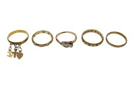 A 9ct and plat, three stone diamond chip set crossover ring, size M, together with three other 9ct