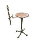 A Victorian walnut and cast iron reading stand, width 45cm, depth 38cm, height 96cm
