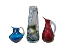 A Whitefriars ‘Knobbly’ art glass vase (Pattern No. 9612) in a streaky green, black, and grey