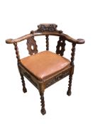 A Victorian carved oak corner chair, width 81cm, depth 65cm, height 83cm