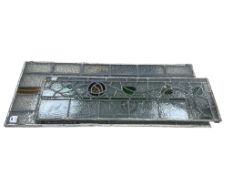 Seven salvaged 19th/20th-century decorative stained glass panels, together with a quantity of