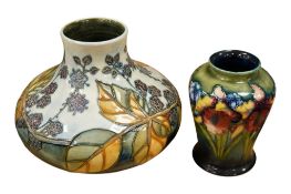 A Moorcroft pottery tube lined ‘Bramble’ patterned squat vase probably by Lorraine Knowles, height