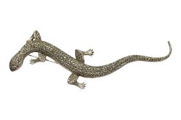 A white metal and polished steel lizard brooch, length 15cm.
