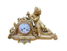 A Pape & Girardeau mantel clock, the gilt-metal case surmounted by a seated putto holding flowers,