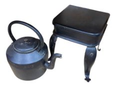 A Georgian painted steel footman, height 32cm and a Victorian cast iron kettle.