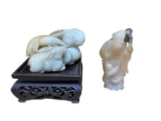 A Chinese jade group of rabbits and a soapstone group of Shou Lao, together with a square carved